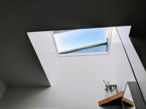 Portland home with beautiful skylight installation bringing natural light and energy efficiency to interior living space