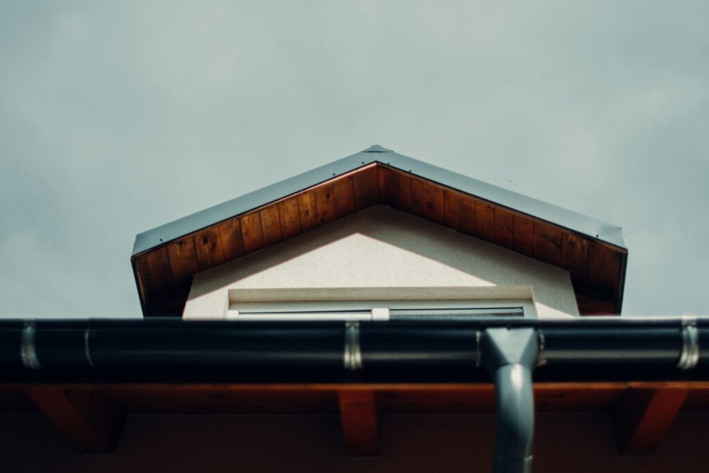 Oregon home with professional gutter system installation protecting against summer storms and providing year-round water management