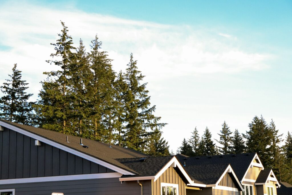 Best roofing materials comparison for Oregon and Washington climate showing HOMEMASTERS expertise in PNW weather-resistant solutions