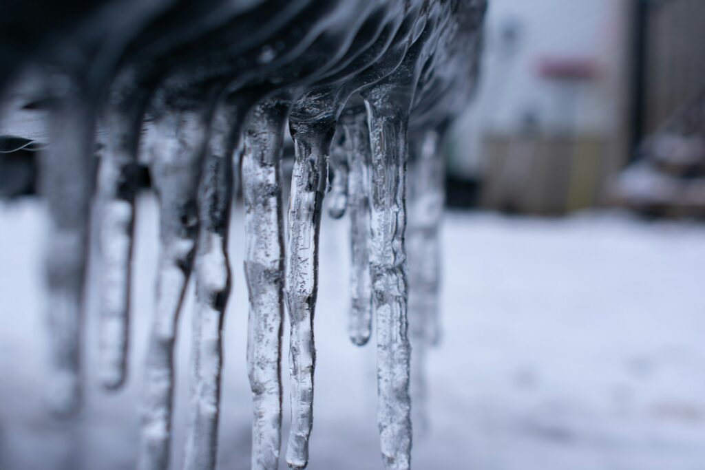 Central Oregon gutter system maintenance and ice dam prevention for Bend home during fall freeze-thaw cycle preparation
