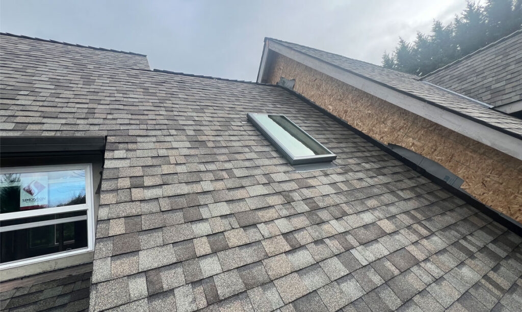 VELUX skylight installed in a Portland SW Oregon home bringing natural light into a kitchen with new roofing