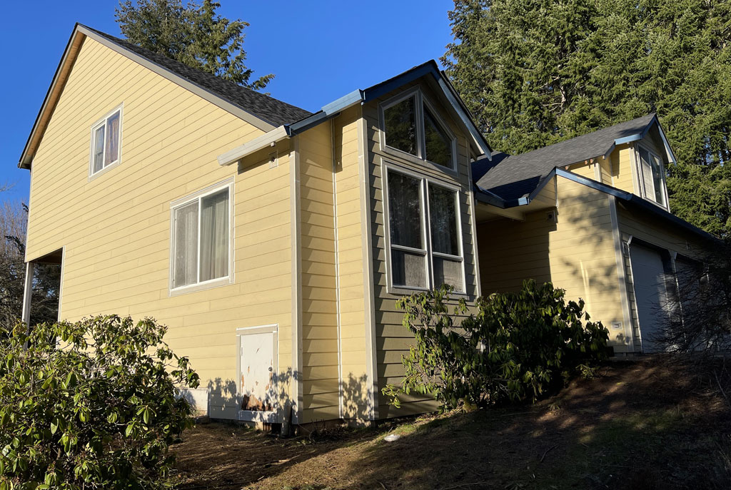 New energy-efficient windows installed on a Portland SW Oregon home alongside roof replacement by HOMEMASTERS