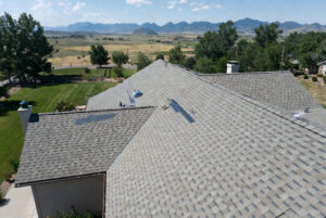HOMEMASTERS Idaho roofing crew installing new architectural shingles on a Boise Idaho home in summer