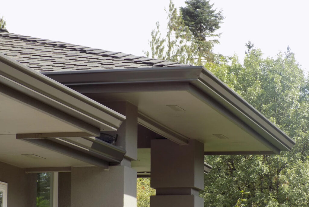 HOMEMASTERS Vancouver crew installing seamless aluminum gutters on a Clark County Washington home before fall