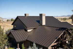 Standing seam metal roof installed by HOMEMASTERS on a Boise Idaho home under high desert sun