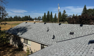 Ice buildup along the eave of a low pitch roof in Redmond, Oregon during a Central Oregon winter