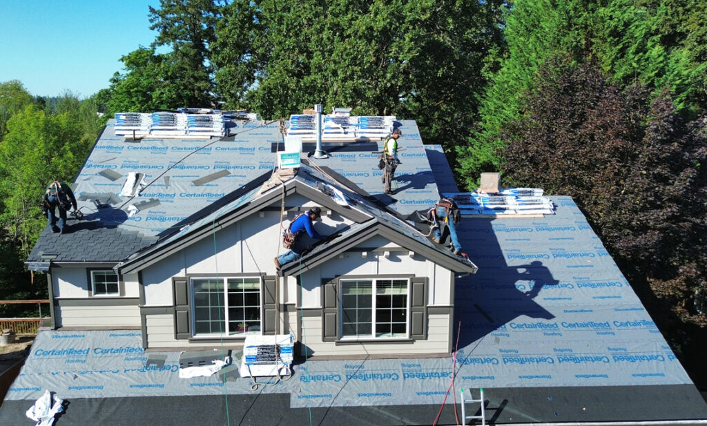 Steep pitch roof with multiple dormers on an older home in Silverton, Oregon