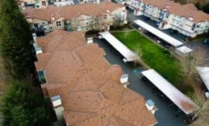 Low slope commercial roof membrane and parapet detail on a building in Grants Pass, Oregon